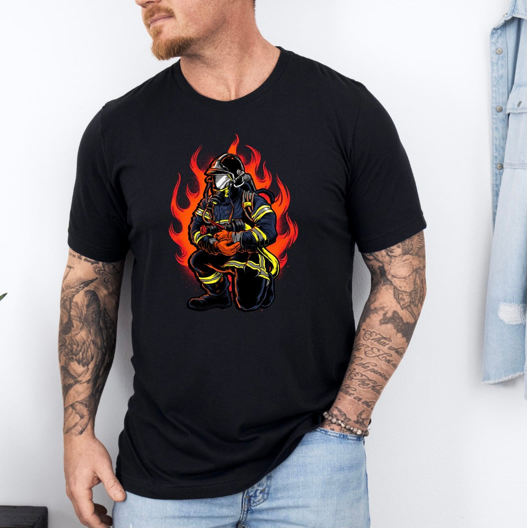 Firefighter Graphic T-Shirt – Kneeling Firefighter in Flames Unisex Tee | Fire Service Pride Shirt